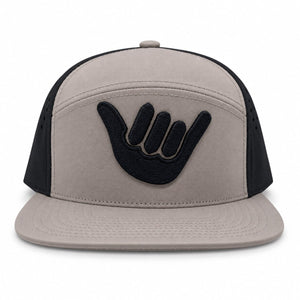Front view of the Howzit Arched Performance Snapback with embroidered shaka.