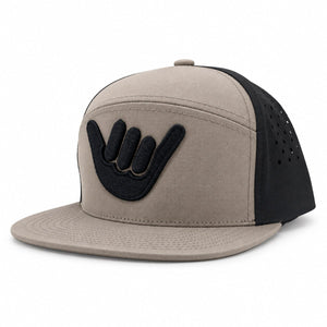 Howzit Arched Performance Snapback in mink and black, three-quarter view.